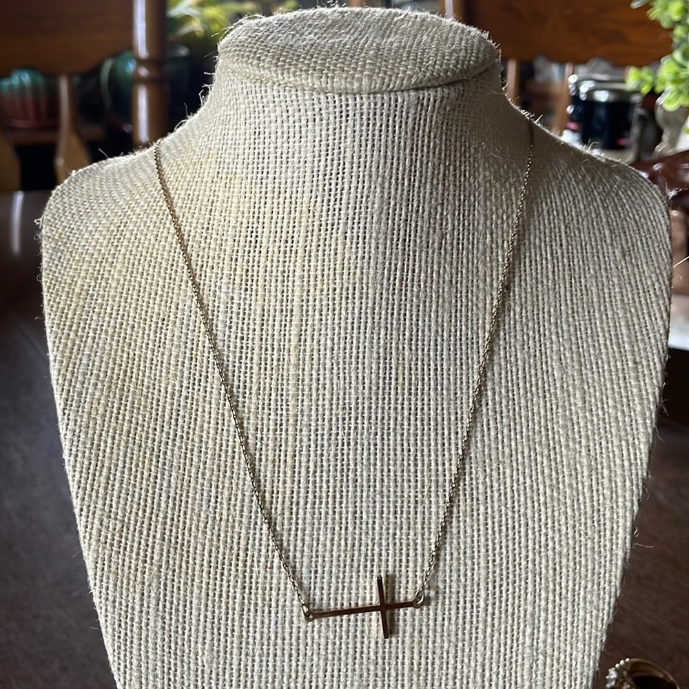 Goldtone horizontal cross